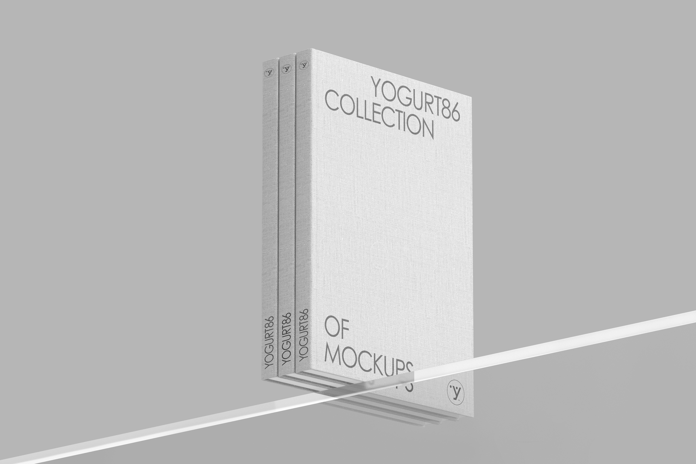 A mockup of three stylish hardcover books with a canvas-like texture. Perfect for presenting cover designs, publishing materials, and special editions. **The books are placed vertically on a transparent glass surface**, which gives the whole thing a light and modern look. Perfect for visualizing book covers, photo albums, catalogs, or elegant notebooks. Designed for publishers, graphic designers, authors, and content creators.